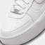 Close-up view of the pristine white leather upper on the Air Force Ones Platform shoe.